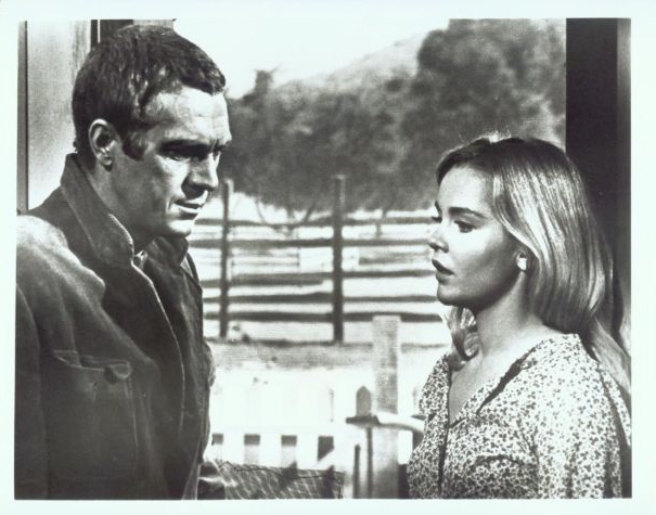 Eric (McQueen) and Christian (played by Tuesday Weld).
On the farm.